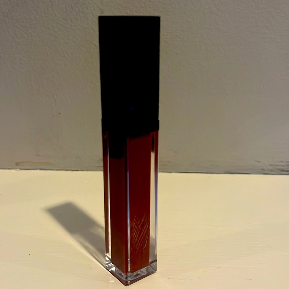 Gucci lip gloss .